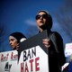 Activist groups such as the Council on American-Islamic Relations, MoveOn.org, Oxfam, and the ACLU hold a rally in front of the White House on January 27, 2018.