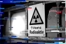 A radiation sign is attached to a barrel containing radioactive water at the Asse nuclear waste disposal centre in a unused mine near the German village of Remlingen