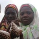 Children sell peanuts on the road to Chibok.
