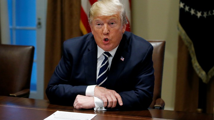Donald Trump speaks about his summit meeting with Vladimir Putin