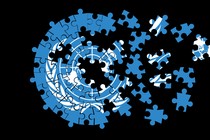 Illustration of the UN logo as an unfinished puzzle