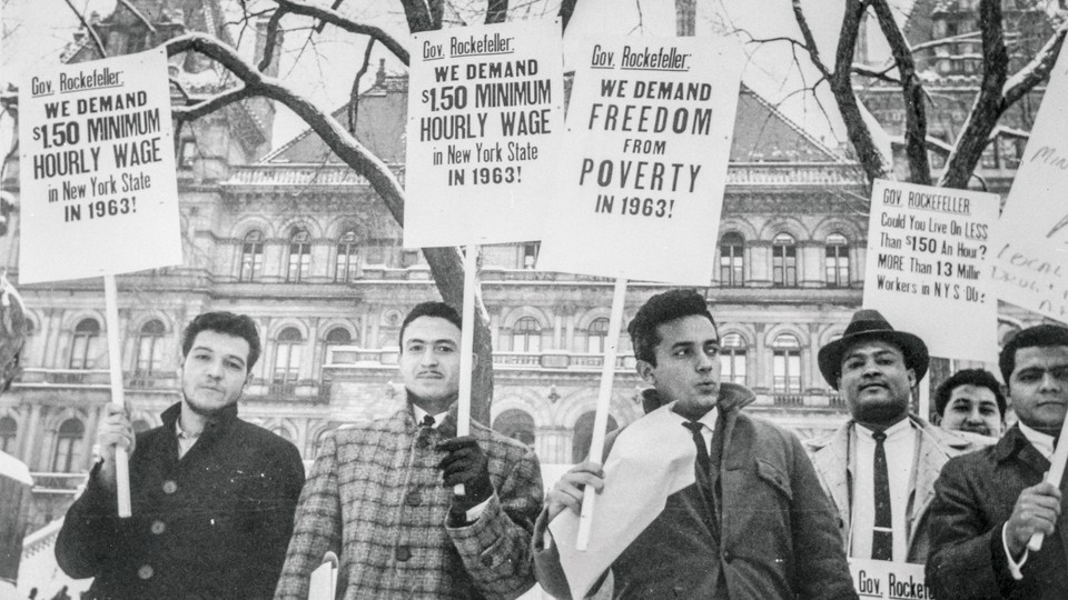 Workers picket the New York State Capitol in Albany for a raise in the minimum wage in 1963.