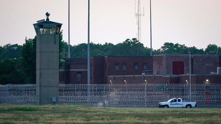 A corrections vehicle patrolled near the Federal Corrections Complex where John Walker Lindh was released from prison today