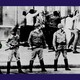 a photo of soldiers and people lined up against a wall