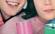 Vintage photograph of two young people smiling and holding colorful cans