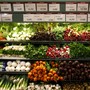 Vegetables on grocery-store produce shelves
