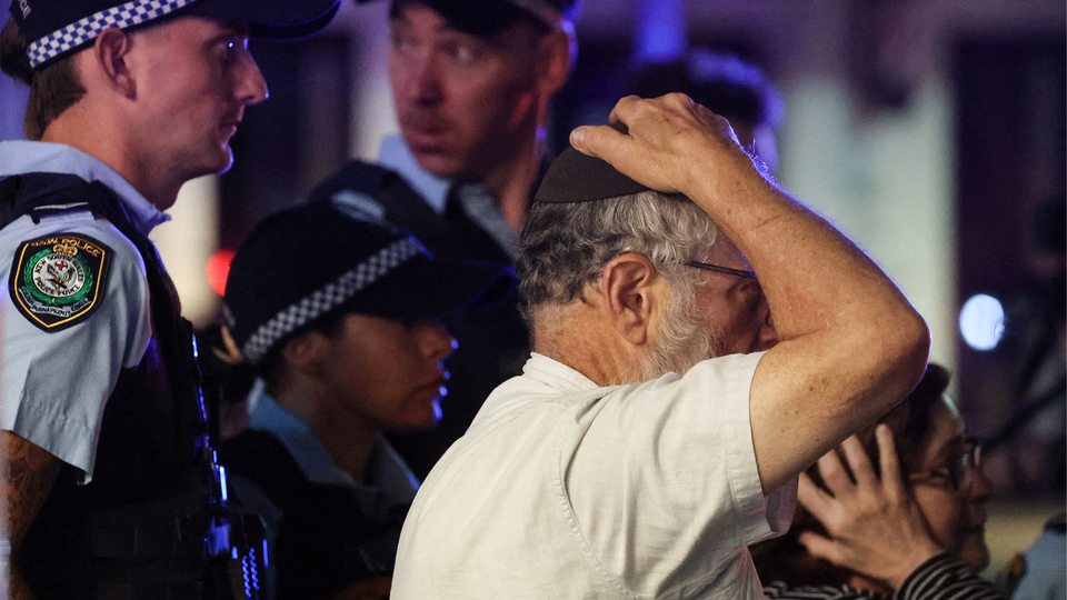 A photo of police and bystanders in Sydney, Australia