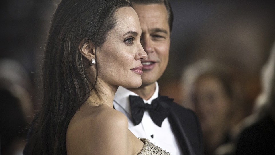Angelina Jolie and Brad Pitt at an event