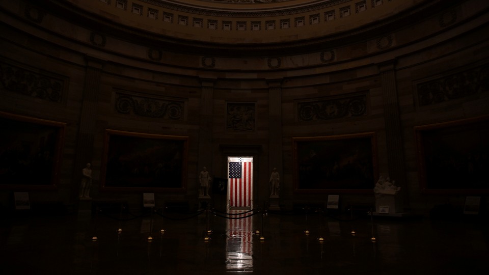 A flag inside the U.S. Capitol