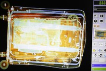 Luggage is seen on the screen of an x-ray security scanner at Sarajevo International Airport.