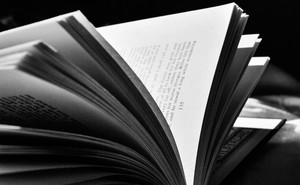 An open book in black-and-white