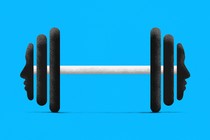 A dumbbell with faces on either side