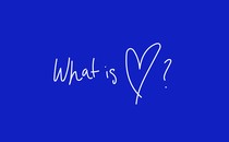 An illustration showing the words "what is [heart]?" seemingly handwritten with white ink over a dark blue solid background.