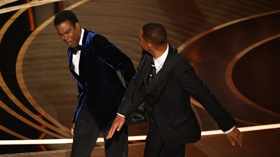 Will Smith and Chris Rock onstage at the Oscars