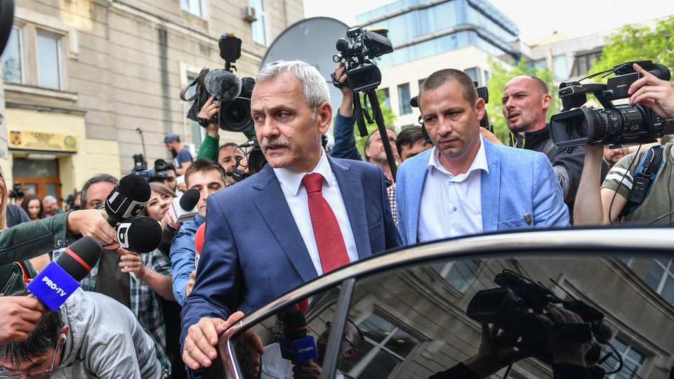 Liviu Dragnea leaves the headquarters of the National Anticorruption Department after he attended a hearing in Bucharest on April 27, 2018