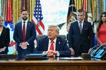 Trump with members of his cabinet in the back