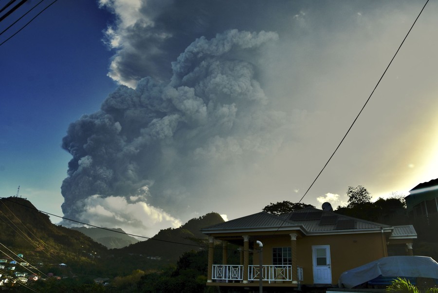 Ash rises into the air as La Soufriere volcano erupts.