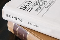 Photo of the upper spines of two books from Nixon's library, 'Bad News' and 'Disraeli,' stacked on top of each other