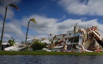 An image of a Florida waterside property ruined by Hurricane Ian.