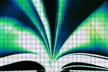 An open book with pages flapping