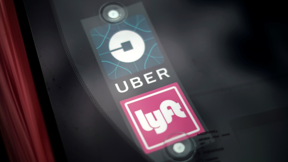 A Lyft and Uber sticker 