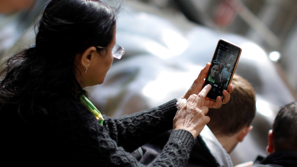 A woman taking a selfie