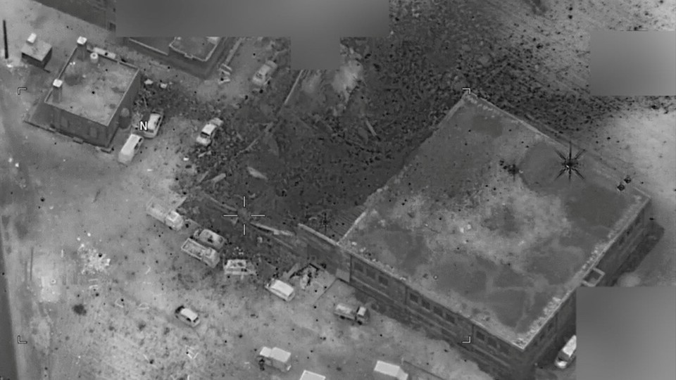 The photograph shows a site struck by the U.S. on March 16 that the Pentagon said was the scene of an al-Qaeda meeting in al-Jinah, Syria.