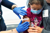 a child getting a COVID vaccine