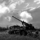 A Ukrainian artillery battery fires at Russian lines.