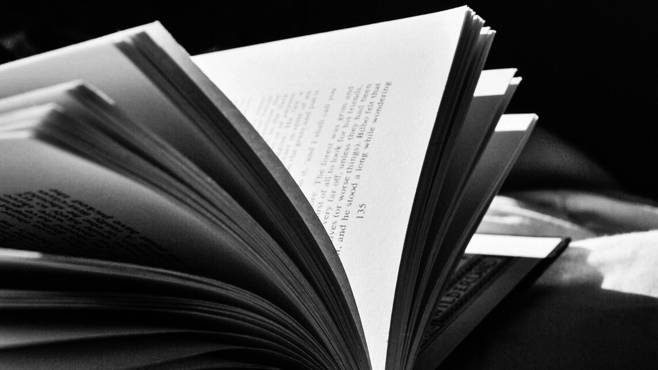 An open book in black-and-white