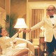 Capote and a high-society woman touch fingers