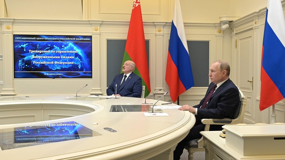 Russian President Vladimir Putin and Belarusian President Alexander Lukashenko sit together