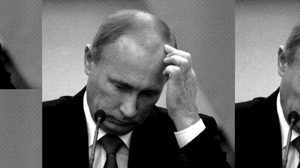 Vladimir Putin scratches his head.