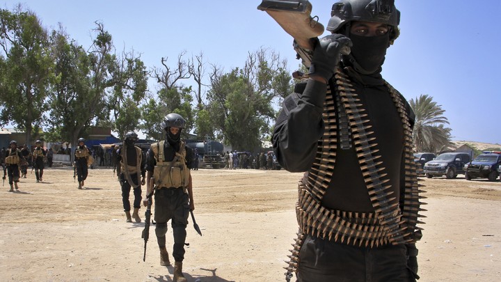 Somali soldiers prepare to secure the capital on the eve of presidential elections on Feb. 7, 2017.