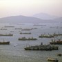 An aerial view of cargo ships in Hong Kong harbor.