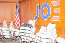 A photo of an empty room after a Democratic Party campaign event for Joe Biden