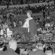 Aimee Semple McPherson speaking in front of a large crowd