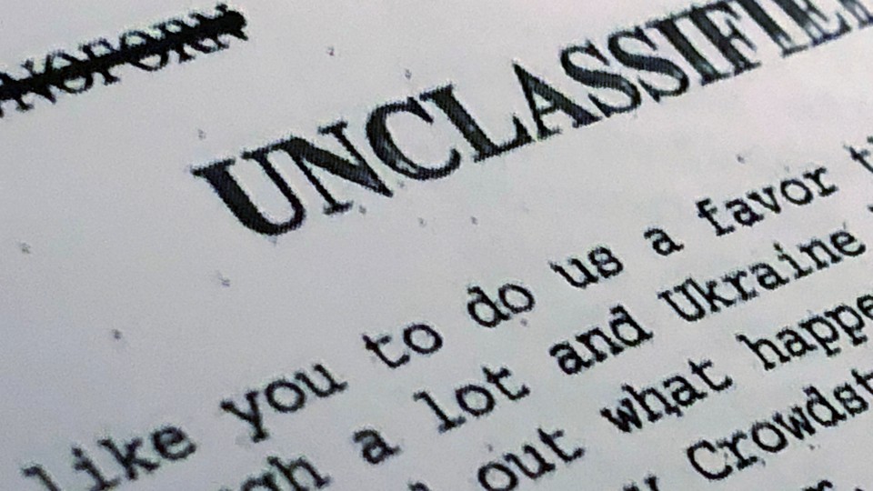 A photograph of the unclassified summary of President Trump's call with President Zelensky.