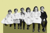 An photo of six children sitting in order of height