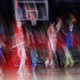 An intentionally blurry image of Washington Wizards players in motion mid-game