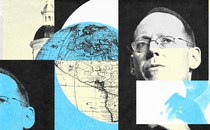 Paul Farmer next to a globe