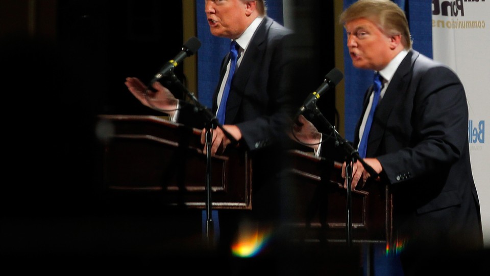 Donald Trump is reflected in mirrors while speaking at the Greater Nashua Chamber of Commerce Expo in 2011.