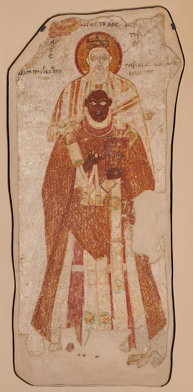 painted wall fragment with two robed figures, one standing in front and one behind with hands on front figure's shoulders