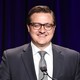 Chris Hayes at a podium