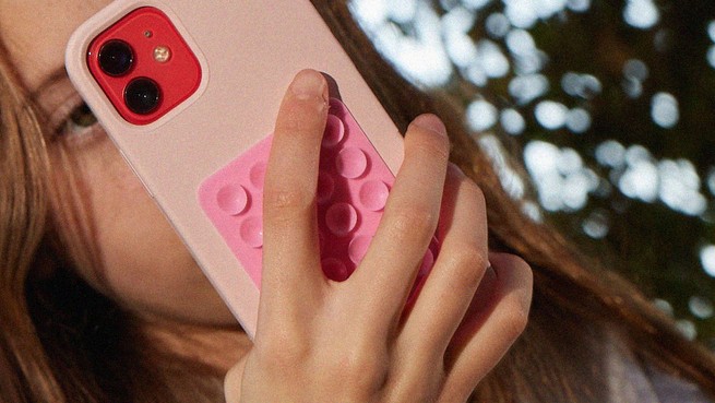 Close-up photo of young woman on her phone