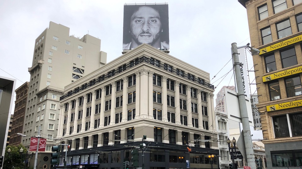 The former San Francisco quarterback Colin Kaepernick appears on a Nike advertisement pictured on top of a building in San Francisco on September 5, 2018.