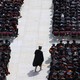 A college graduate walking down the aisle