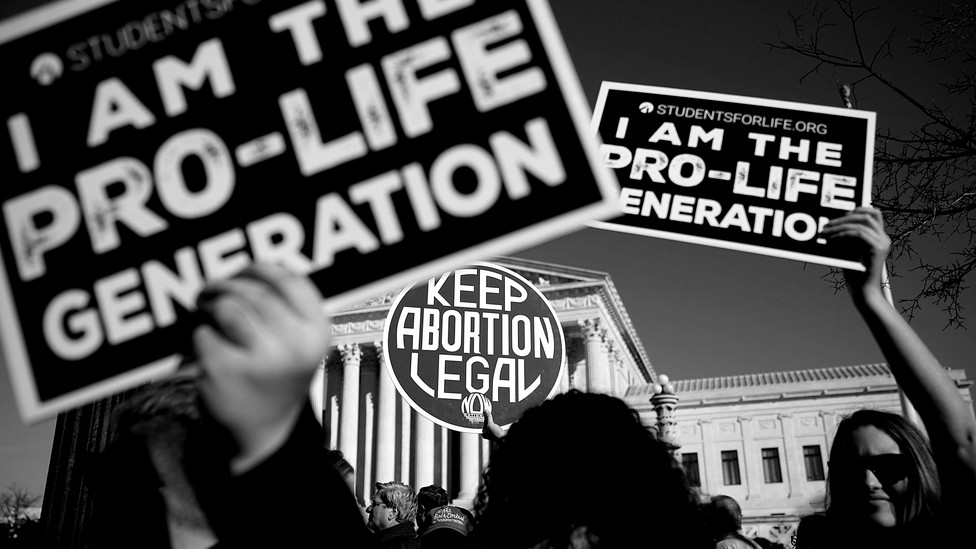 Anti-abortion-rights signs at a protest