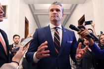 Pete Hegseth talking to reporters