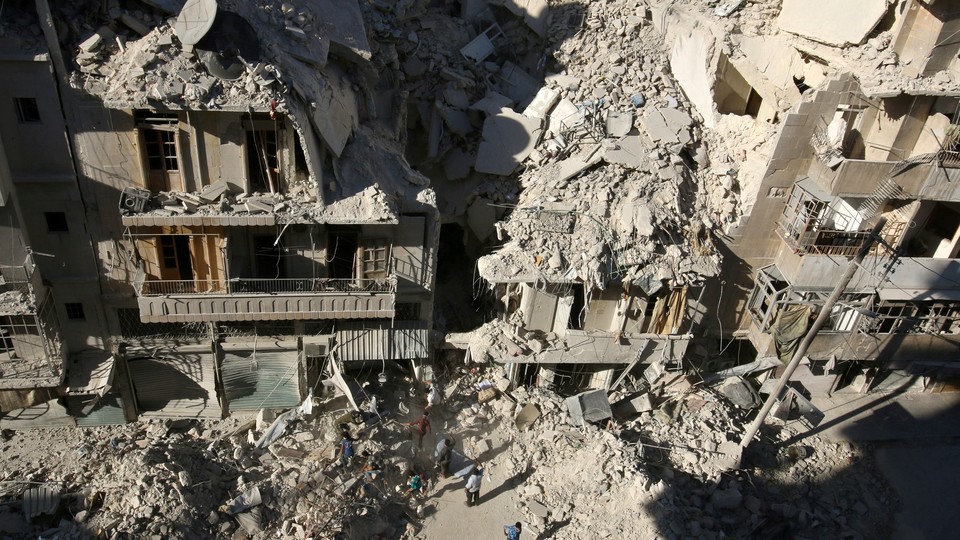 Damaged buildings in the rebel-held Tariq al-Bab neighborhood of Aleppo, Syria.
